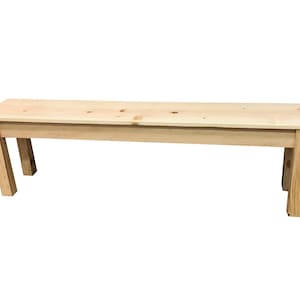May include: A simple, natural wood bench with a light wood finish. The bench has a rectangular top and four legs.