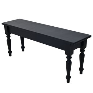 May include: A black wooden bench with turned legs. The bench has a simple, classic design and is perfect for adding a touch of rustic charm to any room.