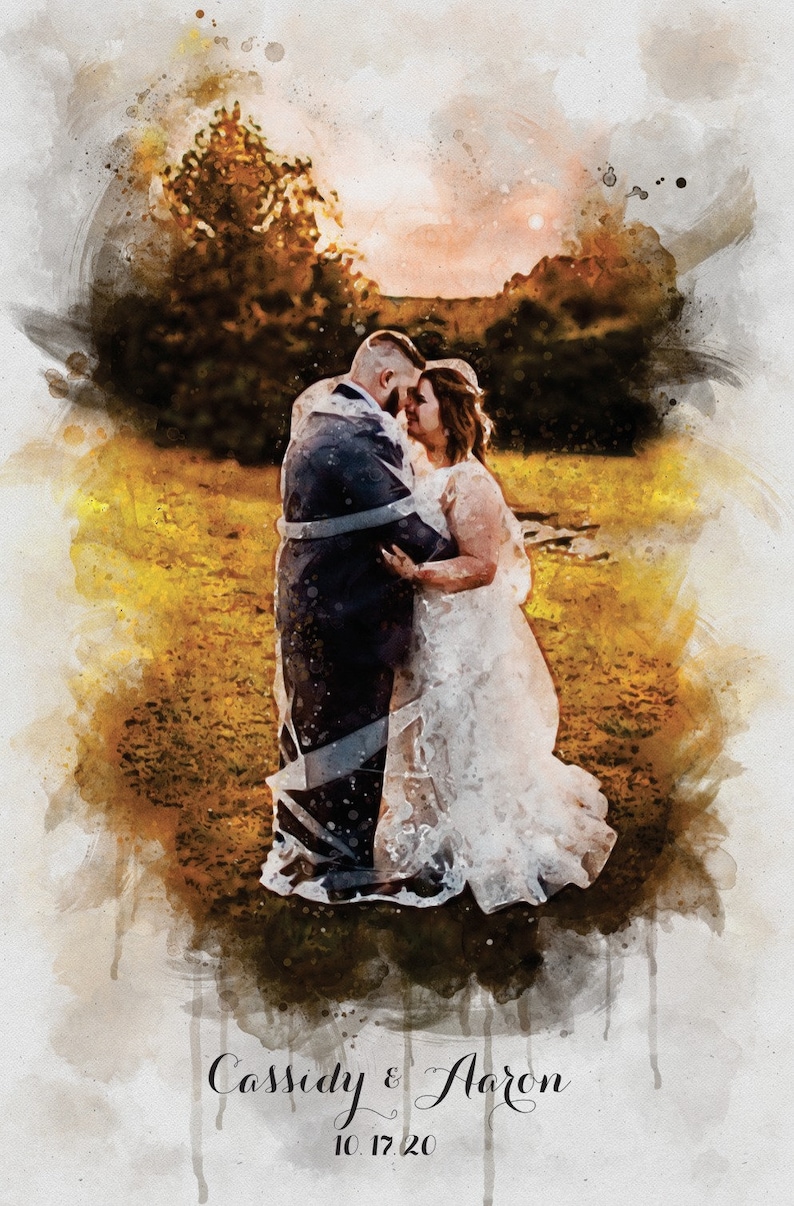 May include: A watercolor painting of a couple embracing in a field. The bride is wearing a white wedding dress and the groom is wearing a dark suit. The couple is surrounded by a golden glow, and the background is a blurred image of trees and a sunset.