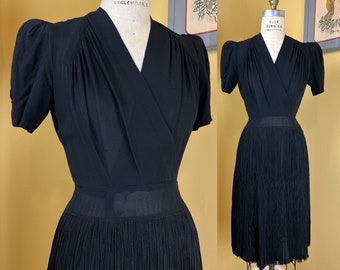 vintage 1940s dress // black rayon crepe + FRINGE skirt early 40s dress // peaked padded shoulders + shirred surplice bodice // 28" waist