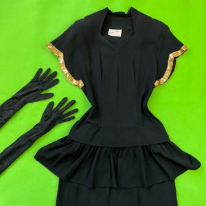 vintage 1940s gown // black rayon 40s party dress by designer Jourdelle of Hollywood // gold sequin trim + ruffled flare peplum // 27&quot; waist