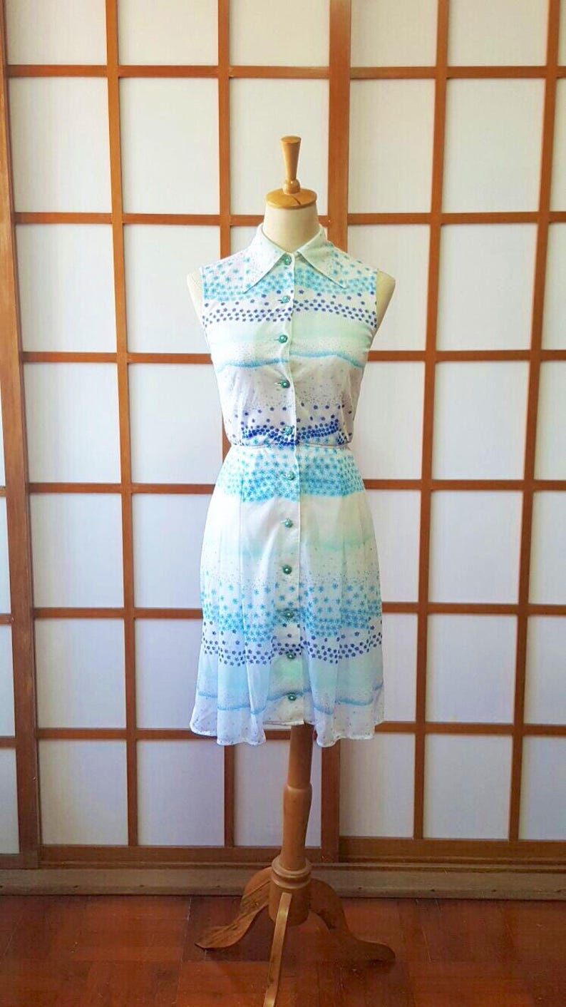 blue and white sleeveless dress