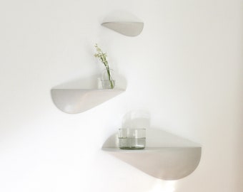 Wall shelf set of 3 made of white concrete