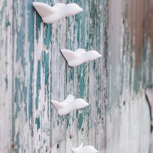 wall hanging, ceramic, "small flock of birds" -  4 White ceramic birds