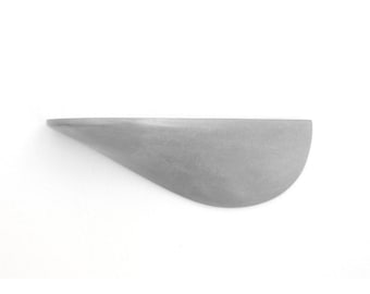 Wall shelf made of concrete light gray medium