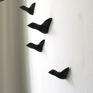 Small flock of 4 birds decoration concrete black