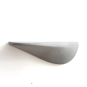 Wall shelf made of concrete light gray small