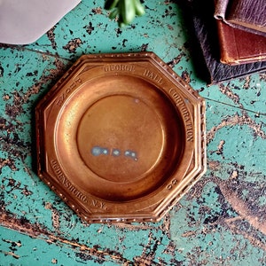 Antique Bronze Advertising Ashtray
