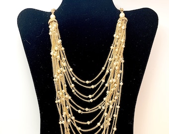 Gold and pearl vintage chain Tassel chain ladies jewelry. Waterfall necklace