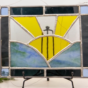 Handcrafted Art Deco stained glass window decor, trendy window decoration, geometric artwork, stylish glass, artisan glass