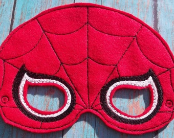 Máscara de fieltro con forma de telaraña - Blanco alrededor de los ojos que brilla en la oscuridad - Bolsa sorpresa para fiestas de superhéroes con temática de juegos de simulación.