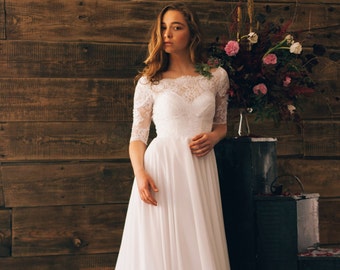 Vintage inspired open back wedding dress with sheer lace sleeve
