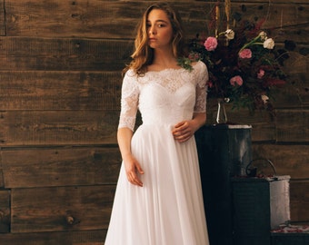 Vintage inspired open back wedding dress with sheer lace sleeve