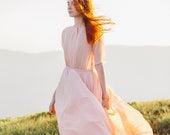 Peach wedding dress with high-neck bodice 