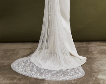 Cathedral embroidered wedding veil with hand-sewn textile petals and crystals