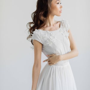 Cap sleeve wedding dress with open back embroidered bodice