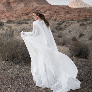 Off-white cape wedding gown with hand-cut silk and crystal embroidery image 1