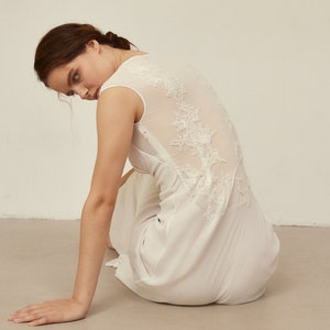 Sheath wedding dress with illusion back