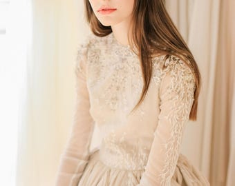 Beige wedding dress with sheer long sleeve embroidered bodice