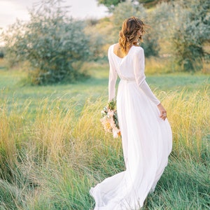 Long sleeve sheath wedding dress with modest high neck bodice