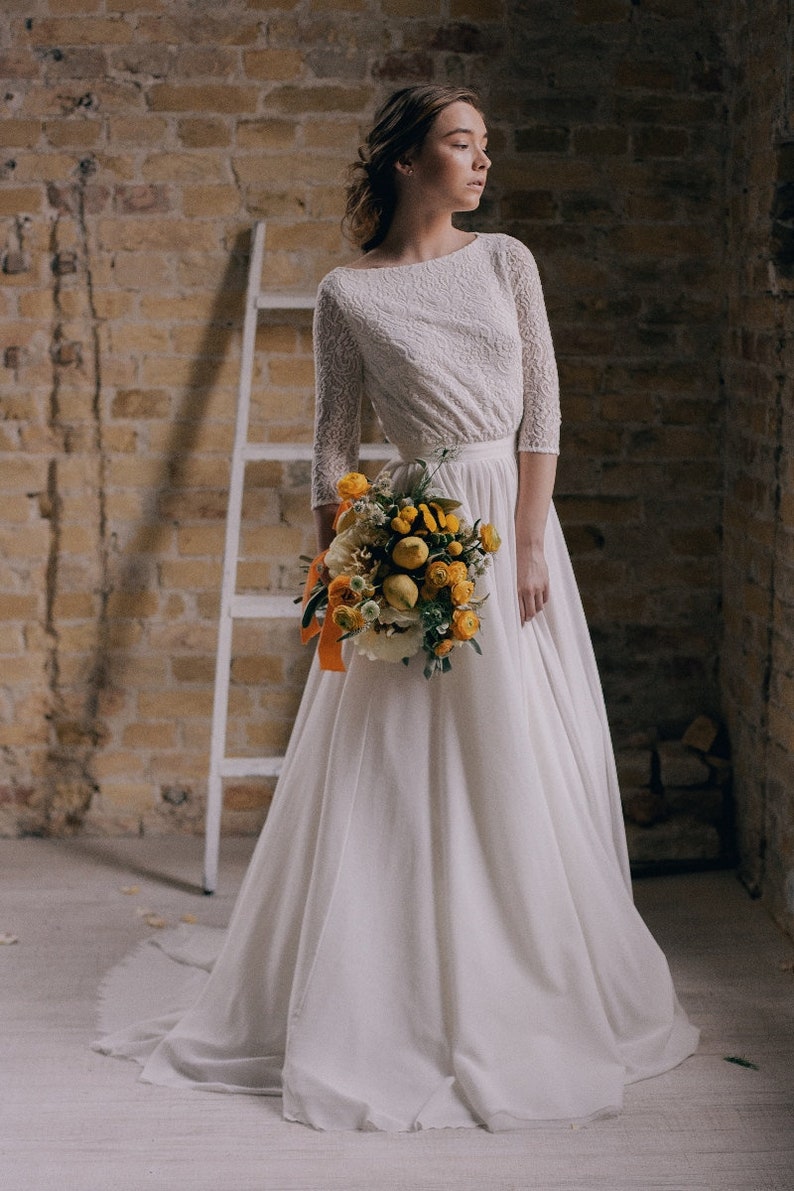 Off-white modest wedding dress with 3/4 sleeve lace bodice image 1