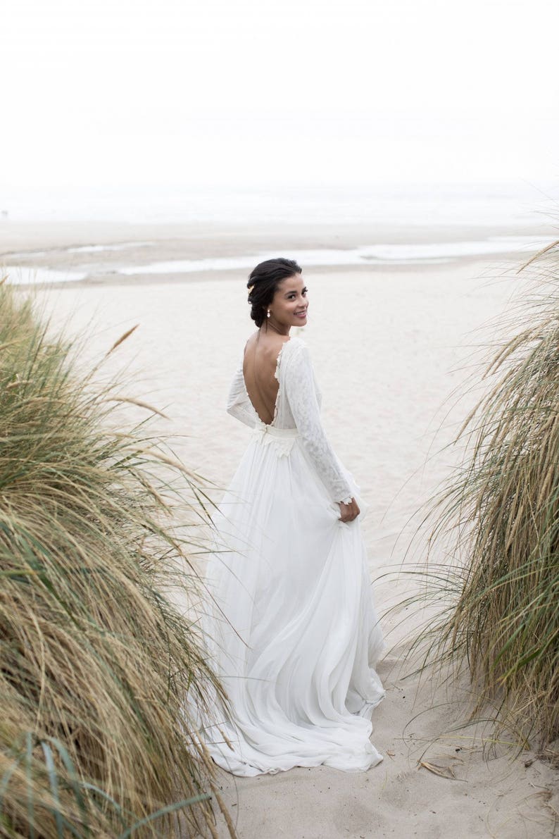 Open-back wedding dress with lace-lined bodice and a flowy skirt image 5