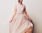 Beige corset wedding dress with sheer sleeveless bodice