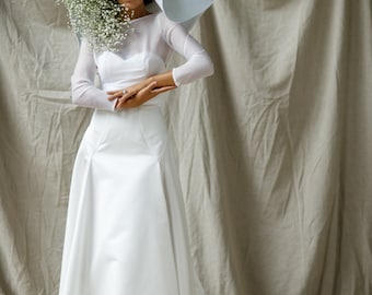 A line strapless satin bridal dress with removable bolero