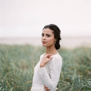 Open-back wedding dress with lace-lined bodice and a flowy skirt image 4