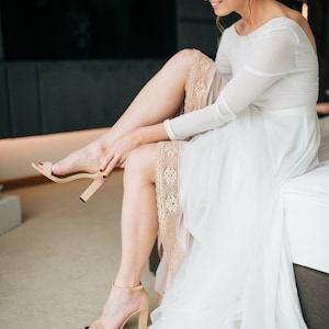 Open back wedding dress with lace trim