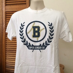 UCLA Bruins t shirt Port Authority White Short Sleeve Runners Super Sunday 5K Adult Medium NCAA Sports T shirts