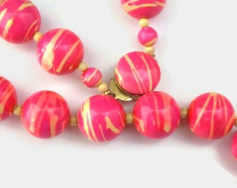 1960's Hot Pink & Yellow Painted Wood Graduated Strand Necklace 24 inches long - Hong Kong