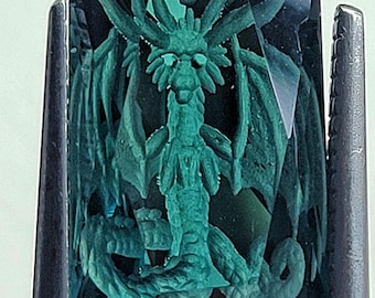 4.4 carat indicolite dark blue tourmaline reverse intaglio carved with a dragon