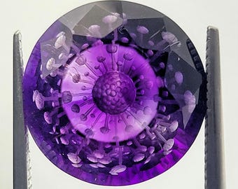 6 carat brandberg amethyst reverse intaglio fantasy cut round with &quot;viral cut&quot;