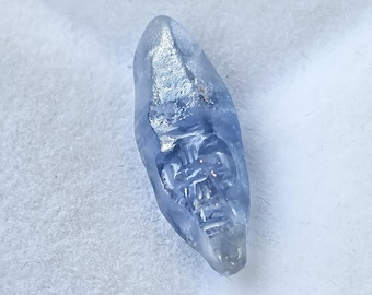 small dogtooth sapphire crystal alien head carving 2.6 carats