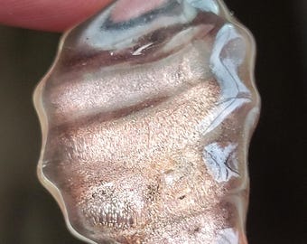 15.4 carat oregon sunstone freeform carving with copper schiller