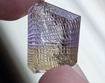 11 carat faceted fantasy carved ametrine