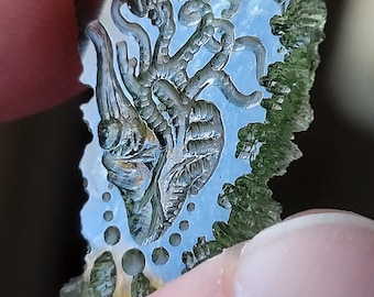 10.8 carat moldavite alien heart carved intaglio