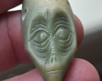 ye ming zhu carved alien bead pendant