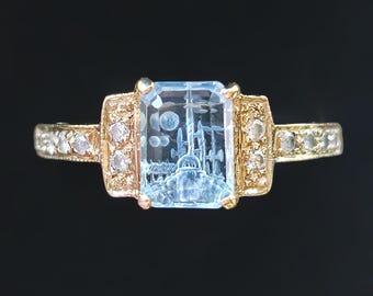 14k size 8 yellow gold ring set with reverse intaglio carved blue topaz Kingdom and accent diamond