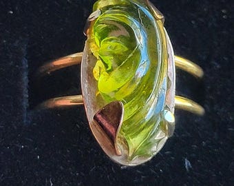 Arizona peridot freeform carving set in 14k gold ring size 6.25
