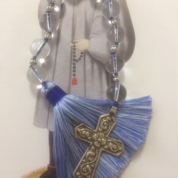 Quartz crystal chaplet with silver cross and blue tassel
