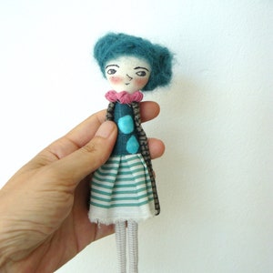 Small hand-embroidered artistic doll. 18cm approx