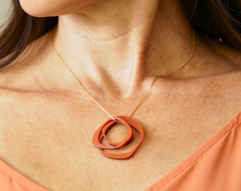 Modern Abstract Iridescent Orange Interlocking Circle Necklace, Plant Based Resin Geometric Pendant, Minimalist Art Statement Jewelry