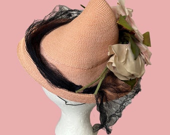 Striking 1940s vintage 1940s Tilt Hat Pink Floral Pointed Peak Vogue Montreal