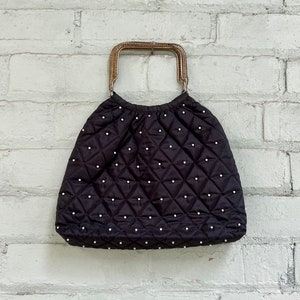 Sac à main noir matelassé vintage des années 60