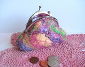 Wet Felted wool coin purse with silk threads, and silk fibers. Peach, purple, pink, green. lined. Exquisite!