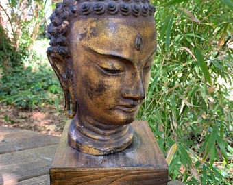 Thai Buddha head on wood display stand