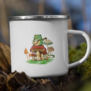 Frog Playing Instrument On Mushroom Enamel Cup, Cottagecore Aesthetic, Nature Lover, Mushroom Mug, Botanical Mug