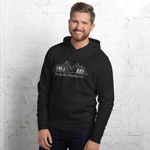 May include: A black hoodie with a white outline of mountains and trees. The text "Seek the Outdoors" is printed below the image.